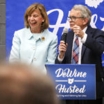 
              Ohio Gov. Mike DeWine, with his wife, Fran, talks with prospective voters at the Stubborn Brother restaurant in Toledo, Ohio, Sunday, May 1, 2022. (Phillip L. Kaplan/The Blade via AP)
            