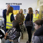 
              First lady Jill Biden visits with volunteers and Ukrainian refugees at a city-run refugee center in Kosice, Slovakia, Sunday, May 8, 2022. The center is a place for Ukrainian refugees to rest and prepare for onward travel. Biden will then travel to the Slovak border with Ukraine to meet with refugees. (AP Photo/Susan Walsh, Pool)
            