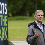 
              Des Moines Water Works CEO Ted Corrigan speaks during a Plots in the Park media event, Tuesday, May 24, 2022, in Des Moines, Iowa. Des Moines Water Works has for years engaged in a bitter struggle to clean up drinking water that comes from rivers teeming with agricultural pollutants, resorting to filing lawsuits, proposing legislation and even public shaming to force farmers to reduce runoff from their fields. None of it worked, so now they are trying another approach -- inviting farmers to learn the latest techniques for reducing pollution at riverfront plots of corn and soybeans in the sprawling park where the utility filters the city's drinking water. (AP Photo/Charlie Neibergall)
            