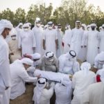 
              This photo made available by the Ministry of Presidential Affairs, shows Sheikh Mohamed bin Zayed Al Nahyan, Ruler of Abu Dhabi, center left, with others, attends the burial of Sheikh Khalifa bin Zayed Al Nahyan, President of the United Arab Emirates, with other members of royal family at Al Bateen cemetery, in Abu Dhabi, Friday, May 13, 2022. (Ministry of Presidential Affairs via AP/Abdulla Al Junaibi)
            