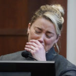 
              Actor Amber Heard testifies in the courtroom at the Fairfax County Circuit Courthouse in Fairfax, Va., Monday, May 16, 2022. Actor Johnny Depp sued his ex-wife Amber Heard for libel in Fairfax County Circuit Court after she wrote an op-ed piece in The Washington Post in 2018 referring to herself as a "public figure representing domestic abuse." (AP Photo/Steve Helber, Pool)
            