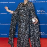 
              Drew Barrymore poses for photographers as she arrives to the annual White House Correspondents' Association Dinner in Washington, Saturday, April 30, 2022. (AP Photo/Jose Luis Magana)
            