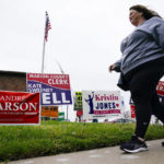 
              A voter enters a polling place during voting in the Indiana primary election in Indianapolis, Tuesday, May 3, 2022. (AP Photo/Michael Conroy)
            