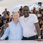 
              Tilda Swinton, left, and Idris Elba pose for photographers at the photo call for the film 'Three Thousand Years of Longing' at the 75th international film festival, Cannes, southern France, Saturday, May 21, 2022. (AP Photo/Petros Giannakouris)
            