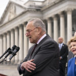 
              Senate Majority Leader Chuck Schumer, D-N.Y., and other Democrats, speak to reporters about a news report by Politico that a Supreme Court draft opinion suggests the justices could be poised to overturn the landmark 1973 Roe v. Wade case that legalized abortion nationwide, at the Capitol in Washington, Tuesday, May 3, 2022. (AP Photo/J. Scott Applewhite)
            