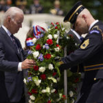
              President Joe Biden lays a wreath at The Tomb of the Unknown Soldier at Arlington National Cemetery on Memorial Day, Monday, May 30, 2022, in Arlington, Va. (AP Photo/Andrew Harnik)
            