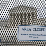 
              An anti-scaling fence has been placed around the U.S. Supreme Court Thursday, May 5, 2022 in Washington. A draft opinion suggests the U.S. Supreme Court could be poised to overturn the landmark 1973 Roe v. Wade case that legalized abortion nationwide, according to a Politico report released Monday. Whatever the outcome, the Politico report represents an extremely rare breach of the court's secretive deliberation process, and on a case of surpassing importance. (AP Photo/Alex Brandon)
            