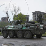 
              An APC of Donetsk People's Republic militia stands not far from Mariupol's besieged Azovstal steel plant, in Mariupol, in territory under the government of the Donetsk People's Republic, eastern Ukraine, Thursday, May 19, 2022. (AP Photo)
            