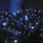 
              Attendees light their phones as John Lee, former No. 2 official in Hong Kong, and the only candidate for the city's top job, during his 2022 chief executive electoral campaign rally in Hong Kong, Friday, May 6, 2022. China is moving to install lee as the new leader of Hong Kong in the culmination of a sweeping political transformation that has gutted the Asian financial center's democratic institutions and placed it ever more firmly under Beijing's control. (AP Photo/Kin Cheung)
            