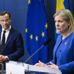
              Sweden's Prime Minister Magdalena Andersson, right, and the Moderate Party's leader Ulf Kristersson give a news conference in Stockholm, Sweden, Monday, May 16, 2022. Sweden's government has decided to apply for a NATO membership. (Henrik Montgomery/TT News Agency via AP)
            