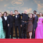 
              Olivia DeJonge, from left, Jerry Schilling, Tom Hanks, Austin Butler, director Baz Luhrmann, Priscilla Presley, Alton Mason, Natasha Bassett, and producer Patrick McCormick pose for photographers upon arrival at the premiere of the film 'Elvis' at the 75th international film festival, Cannes, southern France, Wednesday, May 25, 2022. (Photo by Vianney Le Caer/Invision/AP)
            