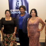 
              Stacey Abrams, center, poses for a photo with the Gwinnett County Democratic Party officers at a fundraiser on Saturday, May 21, 2022, in Norcross, Ga. From left to right are Curt Johnson, Clara Puerta, Abrams, Brenda Lopez and Stephany Sheriff. (AP Photo/Akili-Casundria Ramsess)
            