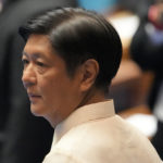 
              Philippine President-elect Ferdinand 'Bongbong" Marcos Jr. waits during his proclamation ceremony at the House of Representatives, Quezon City, Philippines on Wednesday, May 25, 2022. Marcos Jr. was proclaimed the next president of the Philippines by a joint session of Congress Wednesday in an astonishingly huge electoral triumph 36 years after his father was ousted as a brutal dictator by a pro-democracy uprising. (AP Photo/Aaron Favila)
            