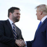 
              FILE - Senate candidate JD Vance, left, greets former President Donald Trump at a rally at the Delaware County Fairground, April 23, 2022, in Delaware, Ohio, to endorse Republican candidates ahead of the Ohio primary on May 3. High-profile surrogates for Republicans running in Ohio’s hotly contested Senate primary are fanning out across the state or holding other events to give their endorsed candidates a last-minute boost ahead of Tuesday’s election. Sens. Josh Hawley, Ted Cruz and Rand Paul, along with Reps. Matt Gaetz and Marjorie Taylor Greene, were among the conservative emissaries making final pitches in the critical Senate race.  (AP Photo/Joe Maiorana, File)
            