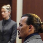
              Actor Johnny Depp walks into the courtroom after a break at the Fairfax County Circuit Courthouse in Fairfax, Va., Monday, May 16, 2022. Depp sued his ex-wife Amber Heard for libel in Fairfax County Circuit Court after she wrote an op-ed piece in The Washington Post in 2018 referring to herself as a "public figure representing domestic abuse." (AP Photo/Steve Helber, Pool)
            