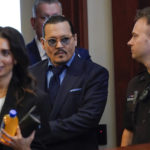 
              Actor Johnny Depp arrives in the courtroom for closing arguments at the Fairfax County Circuit Courthouse in Fairfax, Va., Friday, May 27, 2022. Depp sued his ex-wife Amber Heard for libel in Fairfax County Circuit Court after she wrote an op-ed piece in The Washington Post in 2018 referring to herself as a "public figure representing domestic abuse." (AP Photo/Steve Helber, Pool)
            
