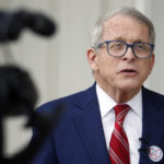 
              Ohio Gov. Mike DeWine talks with reporters outside of his polling place after voting in Cedarville, Ohio, Tuesday, May 3, 2022. (AP Photo/Paul Vernon)
            