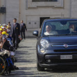 
              Pope Francis arrives in a car in St. Peter's Square at The Vatican, Sunday, May 15, 2022, to celebrate the canonization mass of nine new saints. (AP Photo Gregorio Borgia)
            