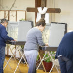 
              Voters cast their ballots in Idaho's Primary Election at Catholic Hall on Tuesday, May 17, 2022, in Emmett, Idaho.  (AP Photo/Kyle Green)
            