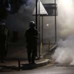 
              Riot police officers operate during a protest at the University of Thessaloniki in northern Greece, Thursday, May 26, 2022. Earlier Thursday, the protesters faced off with police inside the city's main university campus, where unrest has been bubbling for weeks over a left-wing squat that was closed down. (AP Photo/Giannis Papanikos)
            