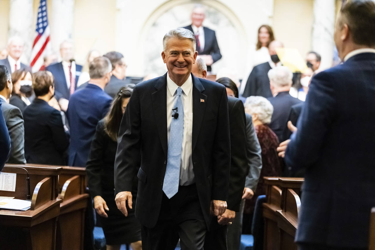 FILE - Idaho Gov. Brad Little leaves the house chambers after he delivers his State of the State ad...
