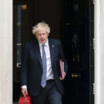 
              British Prime Minister Boris Johnson departs 10 Downing Street, London, Thursday May 26, 2022, the day after the publication of the Sue Gray report into parties in Whitehall during the coronavirus lockdown. (Dominic Lipinski/PA via AP)
            
