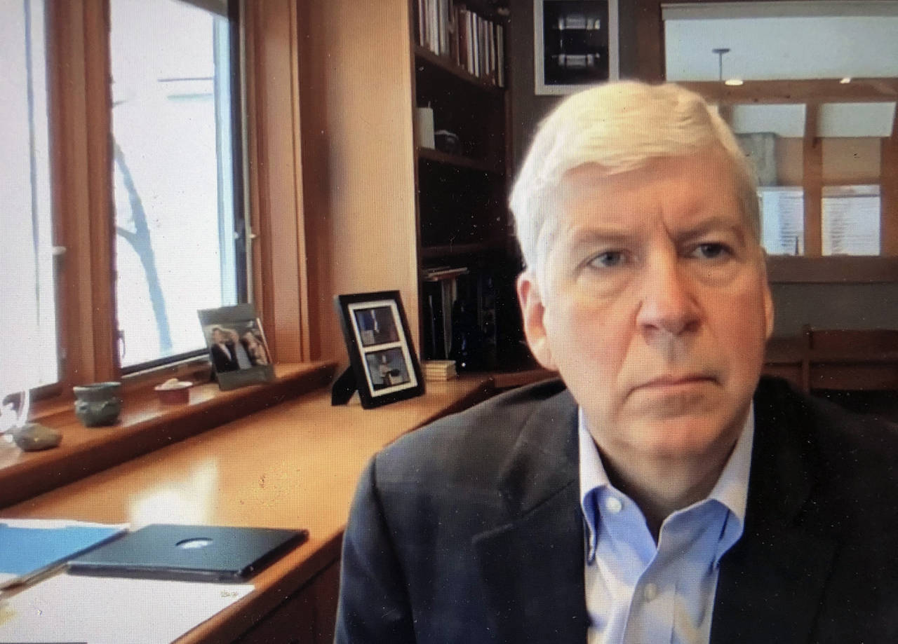 FILE - In this Jan. 18, 2020, screen shot from video, shows former Michigan Gov. Rick Snyder, durin...