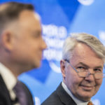 
              Pekka Haavisto, Minister for Foreign Affairs of Finland of Finland, right, and Andrzej Duda, President of Poland address a panel session during the 51st annual meeting of the World Economic Forum, WEF, in Davos, Switzerland, on Tuesday, May 24, 2022. The forum has been postponed due to the Covid-19 outbreak and was rescheduled to early summer. The meeting brings together entrepreneurs, scientists, corporate and political leaders in Davos under the topic "History at a Turning Point: Government Policies and Business Strategies" from 22 - 26 May 2022. (Gian Ehrenzeller/Keystone via AP)
            