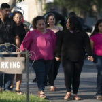 
              People leave a funeral home after attending a visitation for Amerie Garza, a 10-year-old victim who was killed in last week's elementary school shooting in Uvalde, Texas, Monday, May 30, 2022. (AP Photo/Jae C. Hong)
            