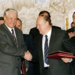 
              FILE - Russian President Boris Yeltsin, left, and Byelorussian leader Stanislav Shushkevich, exchange Slovic Treaty in Brest, USSR (Russia), Dec. 7, 1991. Shushkevich, the former leader of Belarus who led it to independence during the breakup of the Soviet Union, has died. He was 87. Shushkevich died early Wednesday,  May 4, 2022 according to his wife. Last month, he was hospitalized for a few days after contracting COVID-19. (AP Photo, File)
            