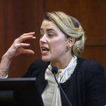 
              Actress Amber Heard testifies in the courtroom at the Fairfax County Circuit Court in Fairfax, Va., Thursday, May 5, 2022. Actor Johnny Depp sued his ex-wife actor Amber Heard for libel in Fairfax County Circuit Court after she wrote an op-ed piece in The Washington Post in 2018 referring to herself as a "public figure representing domestic abuse." (Jim Lo Scalzo/Pool Photo via AP)
            