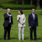 
              From left, Melanie Joly, Foreign Minister of Canada, Jean-Yves Le Drian, Foreign Minister of France,  Annalena Baerbock, Foreign Minister of Germany, Luigi Di Maio, Foreign Minister of Italy, and Elizabeth Truss, Foreign Minister of the United Kingdom stand together for a photo during the G7 Group of leading democratic economic powers at the Weissenhaus resort in Weissenhaeuser Strand, Germany, Friday, May 13, 2022. In addition to the United States and Germany, the G7 also includes Great Britain, France, Italy, Canada and Japan. The main topic of the meeting is the war in Ukraine. (Kay Nietfeld/DPA via AP, Pool)
            