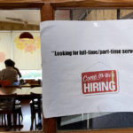 
              A hiring sign is displayed at a restaurant in Morton Grove, Ill., Thursday, April 28, 2022. America’s employers added 428,000 jobs in April, extending a streak of solid hiring that has defied punishing inflation, chronic supply shortages, the Russian war against Ukraine and much higher borrowing costs.   (AP Photo/Nam Y. Huh)
            