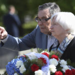 
              U.S Treasury Secretary Janet Yellen, right, talks to Holocaust survivor, Marian Turski, while attending a wreath-laying ceremony in front of the Ghetto Heroes Monument in Warsaw, Poland, Monday, May 16, 2022. (AP Photo/Michal Dyjuk)
            
