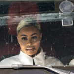 
              Blac Chyna sits in the passenger seat as she leaves Los Angeles Superior Court in Los Angeles, Friday, April 29, 2022. A judge on Friday threw out part of the case against Kim Kardashian in former reality TV star Blac Chyna's lawsuit while the jury deliberates on the elements that remain. (AP Photo/Damian Dovarganes)
            