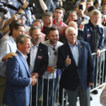 
              Former Vice President Mike Pence, headlining a Get Out the Vote Rally with Governor Brian Kemp, works the crowd with Kemp at the end of the event on the eve of Georgia's primary at the Cobb County International Airport on Monday, May 23, 2022, in Kennesaw, Ga. (Curtis Compton/Atlanta Journal-Constitution via AP)
            