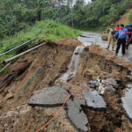
              People inspect the area of a landslide after heavy rainfall in Dima Hasao district, in the northeastern Indian state of Assam, Monday, May 16, 2022. At least eight people have died in floods and mudslides triggered by heavy rains in India’s northeast region, officials said Tuesday. (Dima Hasao district administration via AP)
            