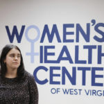 
              The Women's Health Center of West Virginia Executive Director Katie Quiñonez poses for a photo in Charleston, W.Va., on Feb 25, 2022. Even if Roe vs Wade decision legalizing abortion is overturned, she is determined that the clinic stay open and continue providing resources like birth control, emergency contraception and testing and treatment of sexually transmitted infections. (AP Photo/Chris Jackson)
            