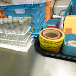 
              Evidence collection tubes, sealing tape and evidence collection envelopes are pictured on an autopsy bay in the Mississippi Crime Laboratory in Pearl, Miss., Aug. 26, 2021. (AP Photo/Rogelio V. Solis)
            