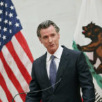 
              FILE - California Gov. Gavin Newsom attends a press conference at City Hall on April 26, 2022, in San Francisco. California's governor and top legislative leaders want to add abortion protections to the state's constitution. Their comments came late Monday, May 3, 2022, after Politico published a draft opinion from the U.S. Supreme Court. (Yalonda M. James/San Francisco Chronicle via AP, File)
            