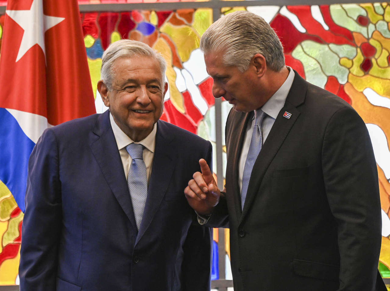 Cuban president Miguel Diaz Canel and his Mexican counterpart Andrés Manuel López Obrador chat af...