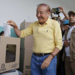 
              Rodolfo Hernandez, presidential candidate with the Anti-corruption Governors League, casts his ballot during presidential elections in Bucaramanga, Colombia, Sunday, May 29, 2022. (AP Photo/Mauricio Pinzon)
            