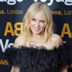 
              Kylie Minogue arrives for the ABBA Voyage concert at the ABBA Arena in London, Thursday May 26, 2022. ABBA is releasing its first new music in four decades, along with a concert performance that will see the "Dancing Queen" quartet going entirely digital. The virtual version of the band will begin a series of concerts on Thursday. (AP Photo/Alberto Pezzali)
            