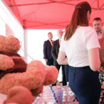 
              First lady Jill Biden listens as she visits a tent operated by Slovak Catholic charities with food and other supplies for refugees during trip to Vysne Nemecke, Slovakia, near the border with Ukraine, Sunday, May 8, 2022. (AP Photo/Susan Walsh, Pool)
            