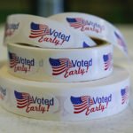 
              Rolls of "I Voted Early" stickers await voters in the final hours of early voting in the primary election in Noblesville, Ind., Monday, May 2, 2022. Indiana's primary election is Tuesday. (AP Photo/Michael Conroy)
            