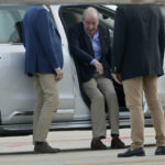
              Spain's former King Juan Carlos gets into a car on arrival by private jet at the Peinador airport in Vigo, north western Spain, Thursday, May 19, 2022. Spain's former King has returned to Spain Thursday for his first visit since leaving nearly two years ago amid a cloud of financial scandals. (AP Photo/Lalo R. Villar)
            