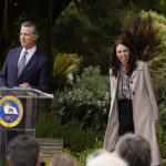 
              California Gov. Gavin Newsom and New Zealand Prime Minister Jacinda Ardern prepare to take questions after an event at the San Francisco Botanical Garden in San Francisco, Friday, May 27, 2022. Gov. Newsom met with Ardern in Golden Gate Park "to establish a new international partnership tackling climate change." (AP Photo/Eric Risberg)
            