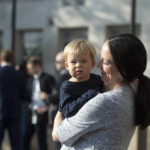 
              Hayley Haldeman, wife of Democrat U.S. Senate candidate, Rep. Conor Lamb,  holds their son Matthew at their polling station Tuesday, May 17, 2022, in Mt. Lebanon, Pa. (Pam Panchak /Pittsburgh Post-Gazette via AP)
            