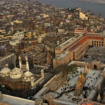 
              An Aerial view shows Gyanvapi mosque, left, and Kashiviswanath temple on the banks of the river Ganges in Varanasi, India, Dec. 12, 2021. A group of Hindus petitioned a local court seeking access to pray inside the mosque compound, saying they believe the Gyanvapi mosque in Varanasi, one of Hinduism’s holiest cities, was built on top of the ruins of a medieval-era temple and that the complex still houses Hindu idols and motifs, a claim that has been contested by the mosque authorities. (AP Photo/Rajesh Kumar Singh)
            