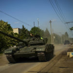 
              Ukrainian tanks move in Donetsk region, eastern Ukraine, Monday, May 30, 2022. (AP Photo/Francisco Seco)
            